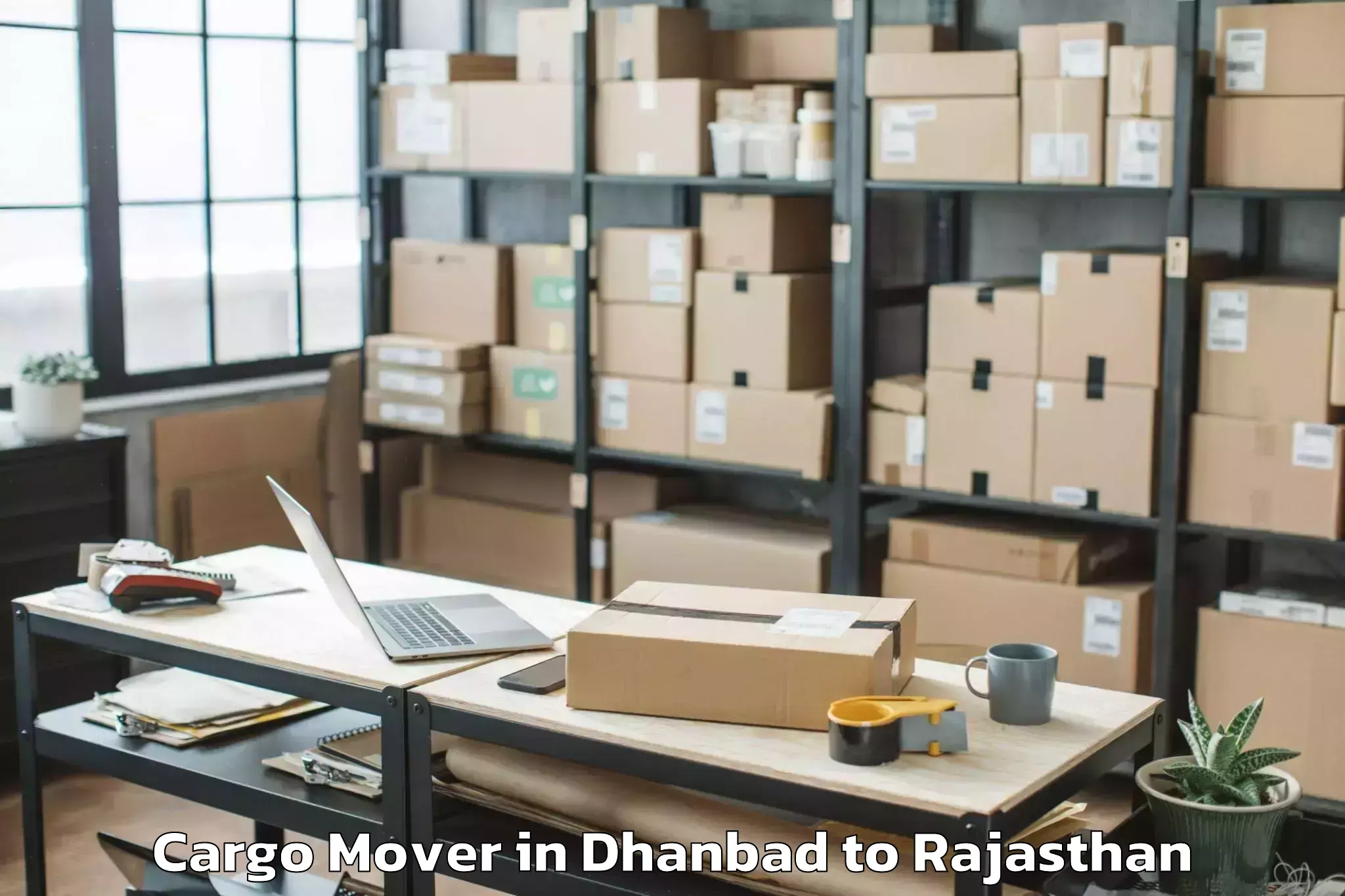 Book Dhanbad to Padampur Cargo Mover